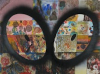 a painting with two eyes on it